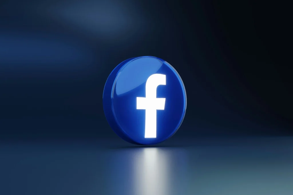 Glowing 3D Facebook logo on a dark background, for an article on Facebook ad creative testing