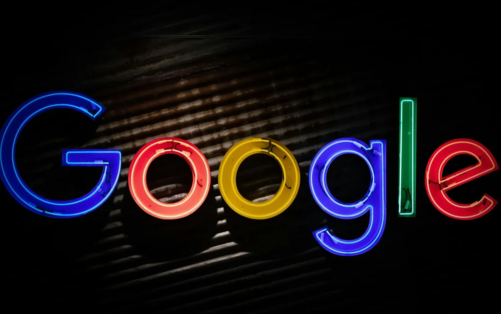 Neon Google logo on a dark wall, for a Google Ads guide