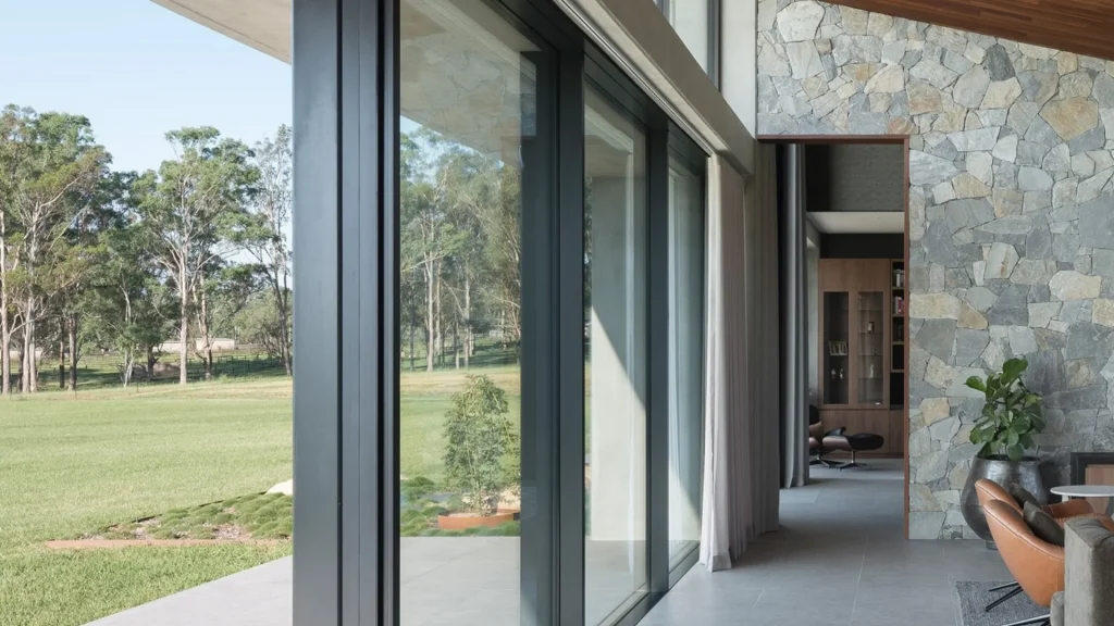 Sliding glass doors opening onto a country property, from a local SEO case study for a sliding door repair company