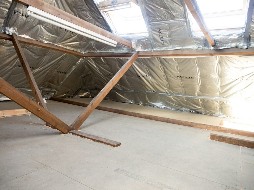 Roof space lined with foil insulation, from a Google Ads case study for an insulation company