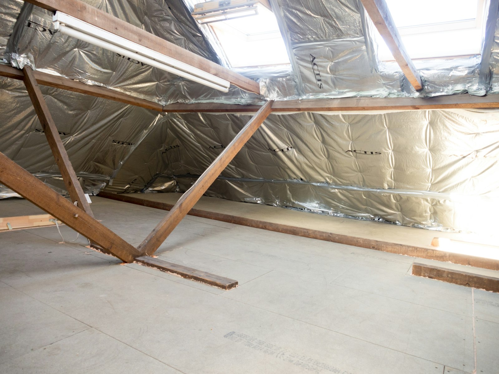 Roof space lined with foil insulation, from a Google Ads case study for an insulation company