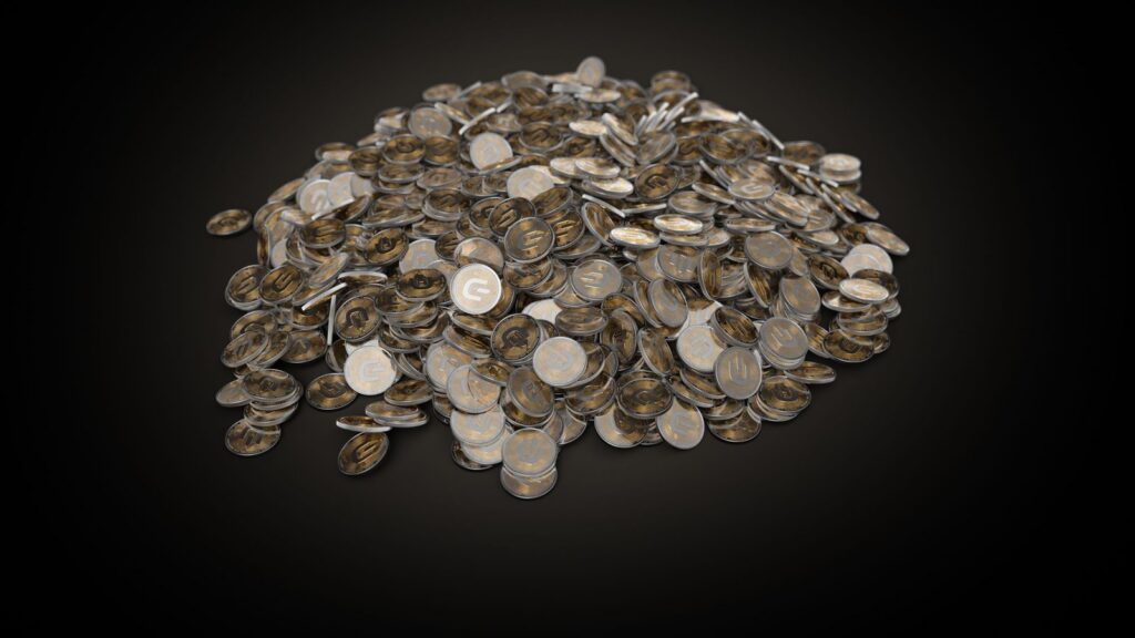Pile of coins on a dark background, illustrating marketing ROI and measuring marketing by profit
